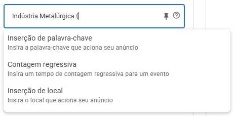 Painel de criação de anúncios no Google Ads exibindo campo de texto com personalizador e menu suspenso de opções.